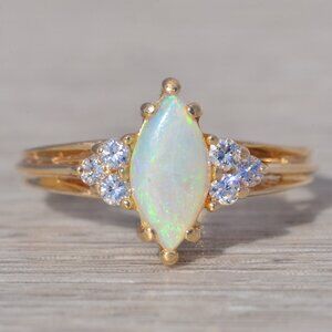 Opal and Natural Diamond Ring in Yellow Gold